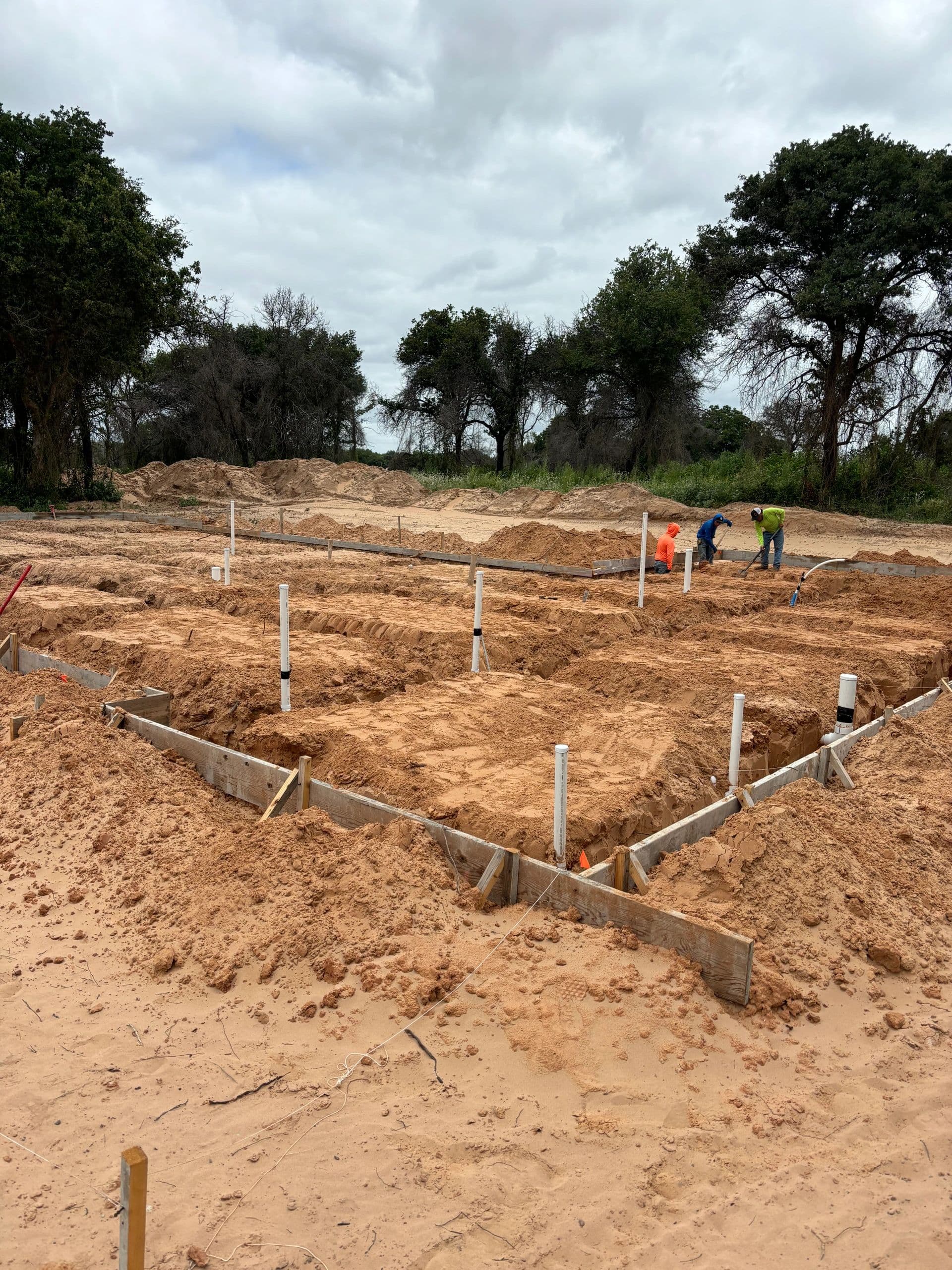 Foundation excavation and forming with crew, North Texas