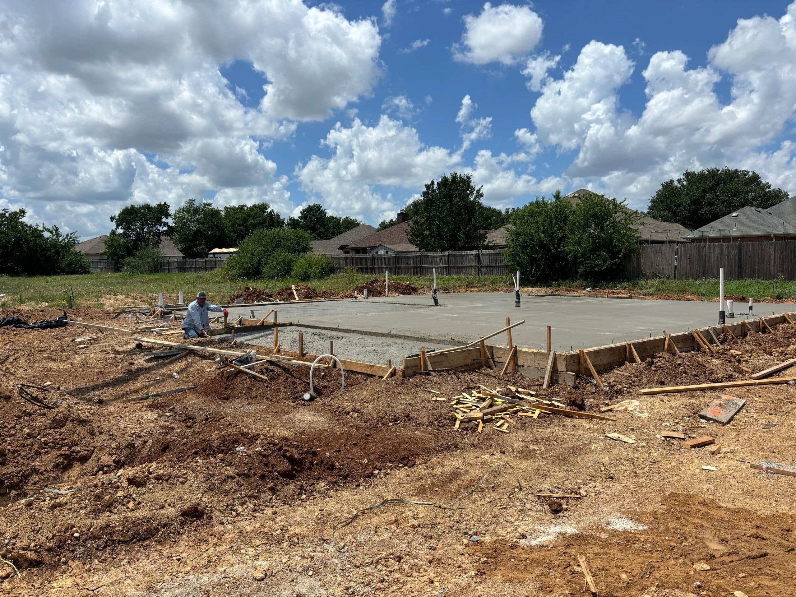 Fresh residential concrete slab pour in progress